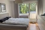 Mehrfamilienhaus mit Büroeinheit und Halle