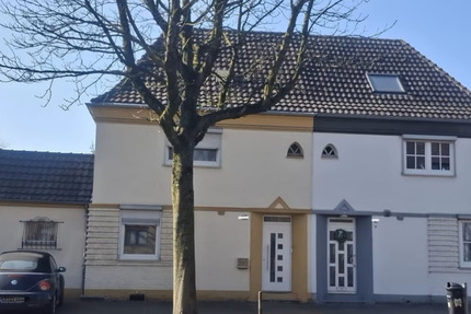 Wohnen oder Neubauen im Herzen von Krefeld - Doppelhaushälfte mit großem Grundstück und Potenzial