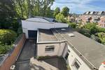 Mehrfamilienhaus mit Büroeinheit und Halle