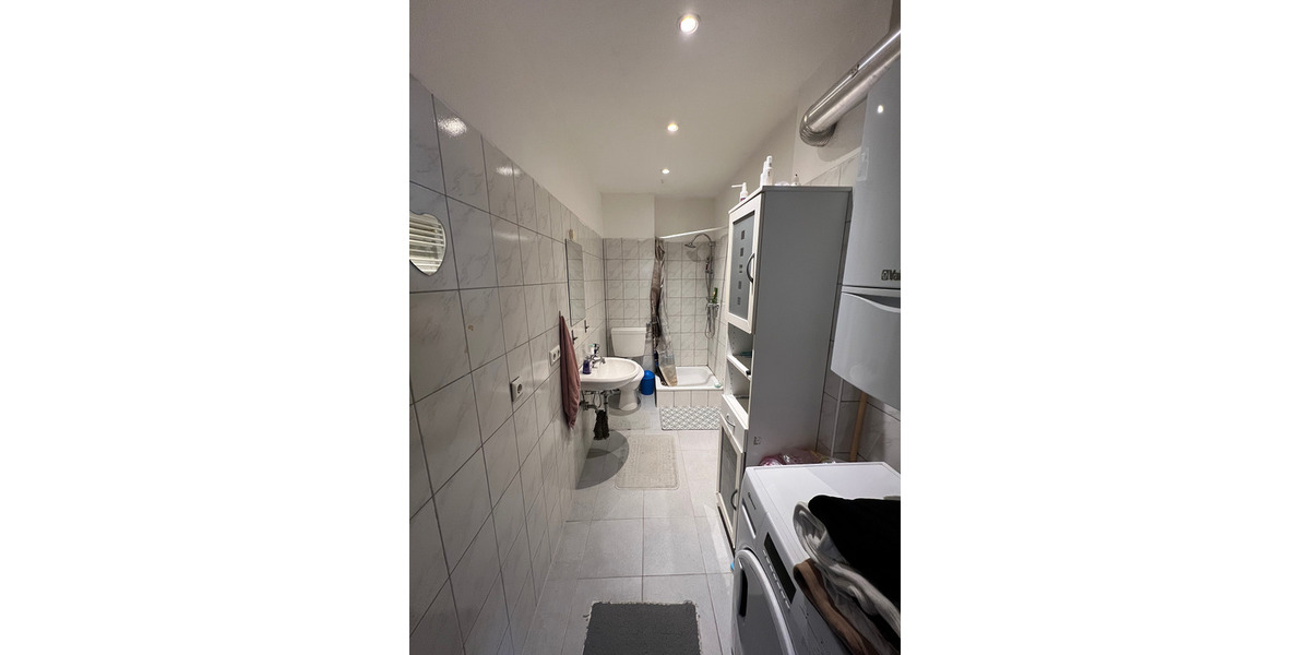 Investorenobjekt mit 3 Wohnungen, 2 Ladenlokalen und Erweiterungsmöglichkeiten 1 zimmer