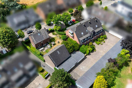 Vollvermietetes Immobilien-Ensemble mit großem Garagenhof in absoluter Top-Wohnlage von MB-Büderich