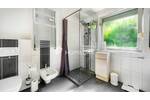 Modernisierte Erdgeschoßwohnung mit Kamin, Massagedusche & privatem Garten - Wohnen mit Stil
