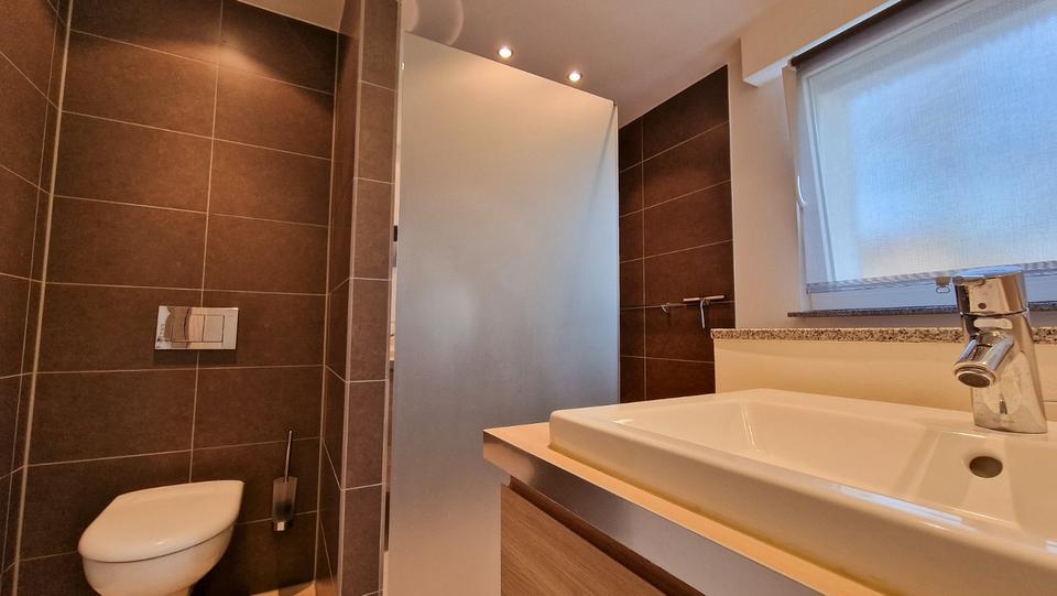 Hochwertige Erdgeschosswohnung mit Garten & beheizbarem Pool 3 zimmer