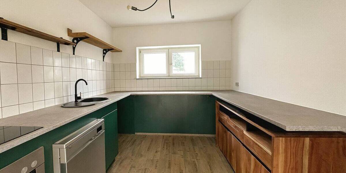 Voll vermietetes 6-Parteien-Haus mit 11-Garagen in guter Lage und Hinterland-Baupotenzial 1 zimmer