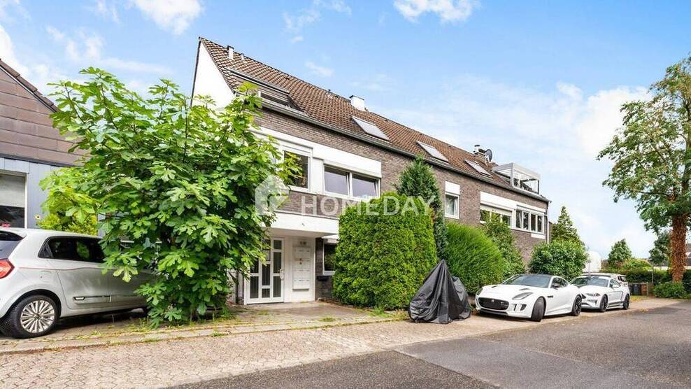 Modernisierte Erdgeschoßwohnung mit Kamin, Massagedusche & privatem Garten - Wohnen mit Stil