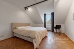 Düsseldorf-Kaiserswerth: Helle, modernisierte Dachgeschoßwohnung mit TG-Stellplatz