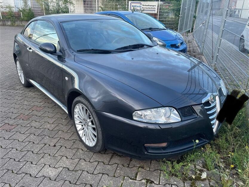 GT