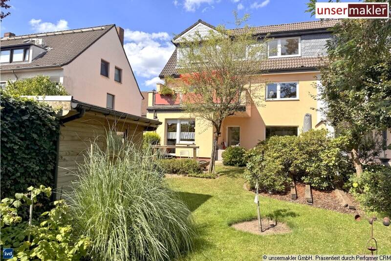 Gepflegtes Dreifamilienhaus zzgl. App. 2x Garagen und Traumgarten