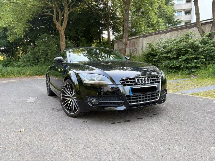 TT