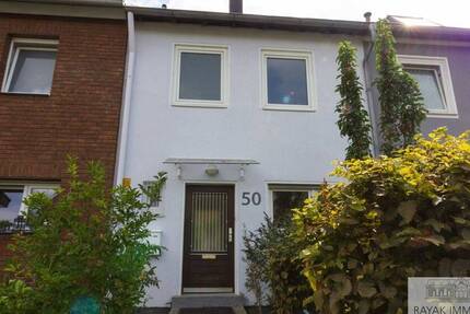 Charmantes Reihenmittelhaus mit durchdachtem Grundriss und Gartenidylle in Benrath
