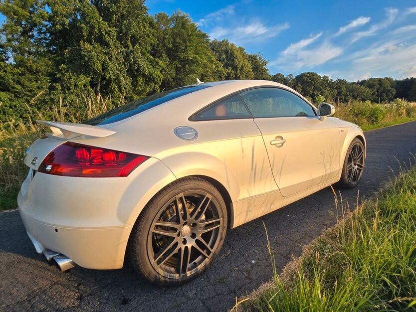 TT