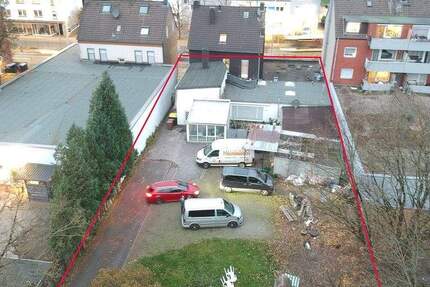 Investorenobjekt mit 3 Wohnungen, 2 Ladenlokalen und Erweiterungsmöglichkeiten zimmer