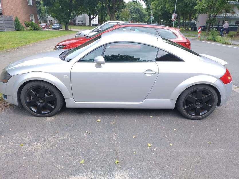 TT