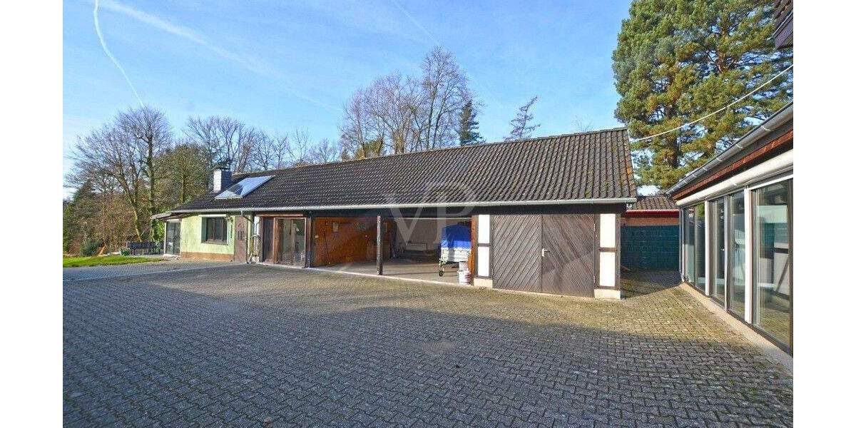 Zweifamilienhaus mit Einliegerwohnung - großer Garten und 3 Garagen 8 zimmer