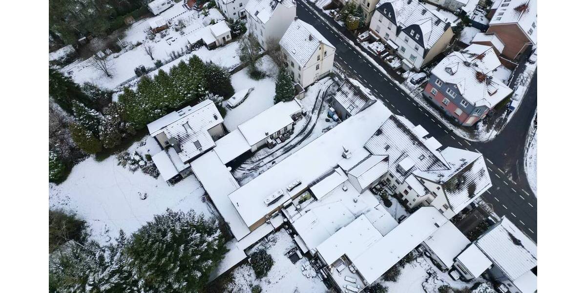 Baugrundstück mit mehreren Wohn- und Gewerbebestandsgebäuden zimmer