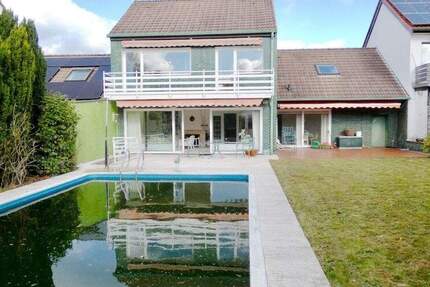Außergewöhnliches Einfamilienhaus mit Terrasse, Garten u.Außenpool 7 zimmer