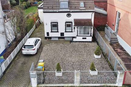 Freistehendes Familienidyll in Düsseldorf-Benrath - Haus mit Garage und Garten