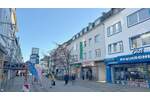 Bestlage Fußgängerzone: Ertragstarkes Wohn-Geschäftshaus mit solventem Ankermieter, 6 Wohneinheiten und 9 Garagen 1 zimmer