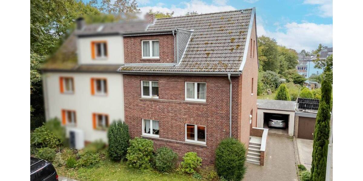 Charmante Doppelhaushälfte aus 1935 mit historischem Flair und großzügiger Grundstücksfläche 5 zimmer