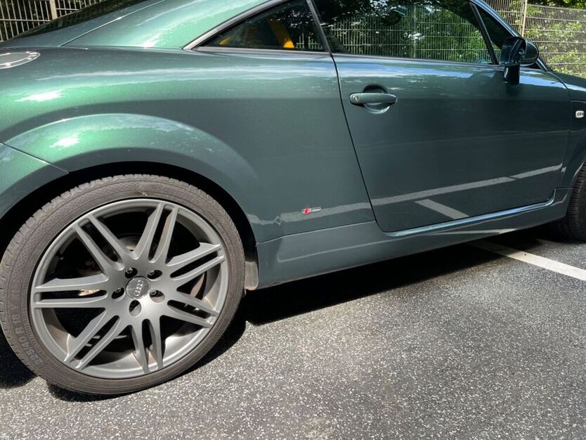 TT