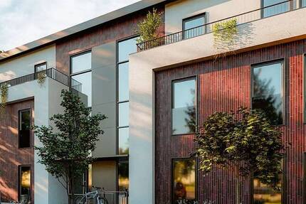 Exklusive 4-Zimmer-Neubauwohnung mit Terrasse, Gartenanteil & Tiefgaragenstellplatz! 4 zimmer