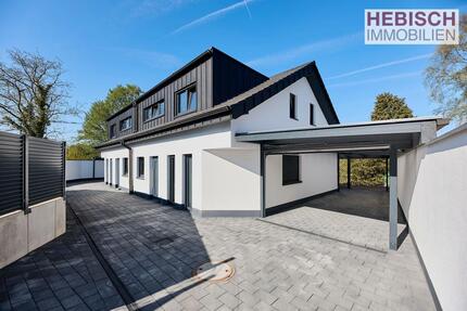 + NEUBAU MIT TOP AUSSTATTUNG + ERSTBEZUG + XXL CARPORT + GARTEN MIT BLICK INS GRÜNE +