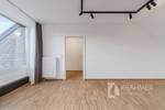 Düsseldorf-Kaiserswerth: Helle, modernisierte Dachgeschoßwohnung mit TG-Stellplatz