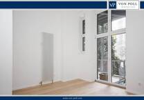 Lichtdurchflutete AltbauWohnung mit großzügigem Balkon zum Innenhof