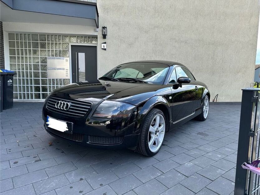 TT